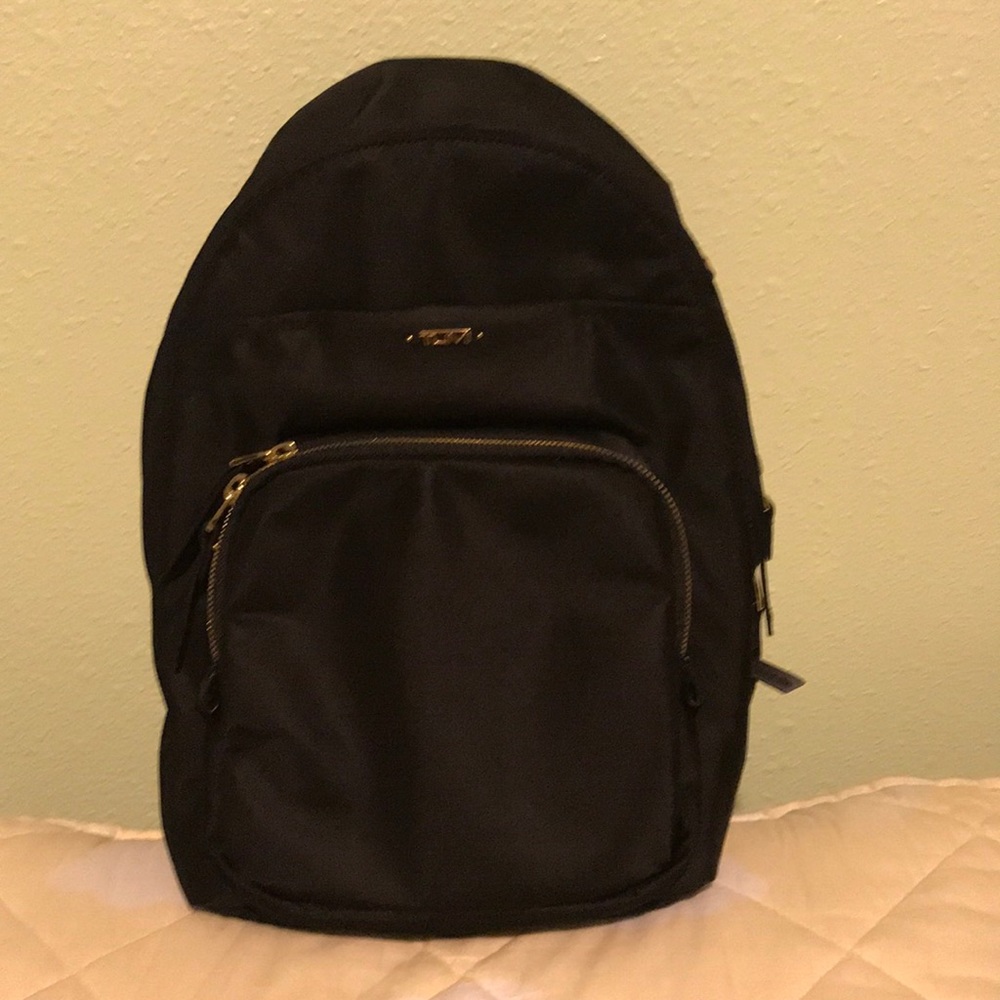 Tumi Nadia sling bag convertible backpack